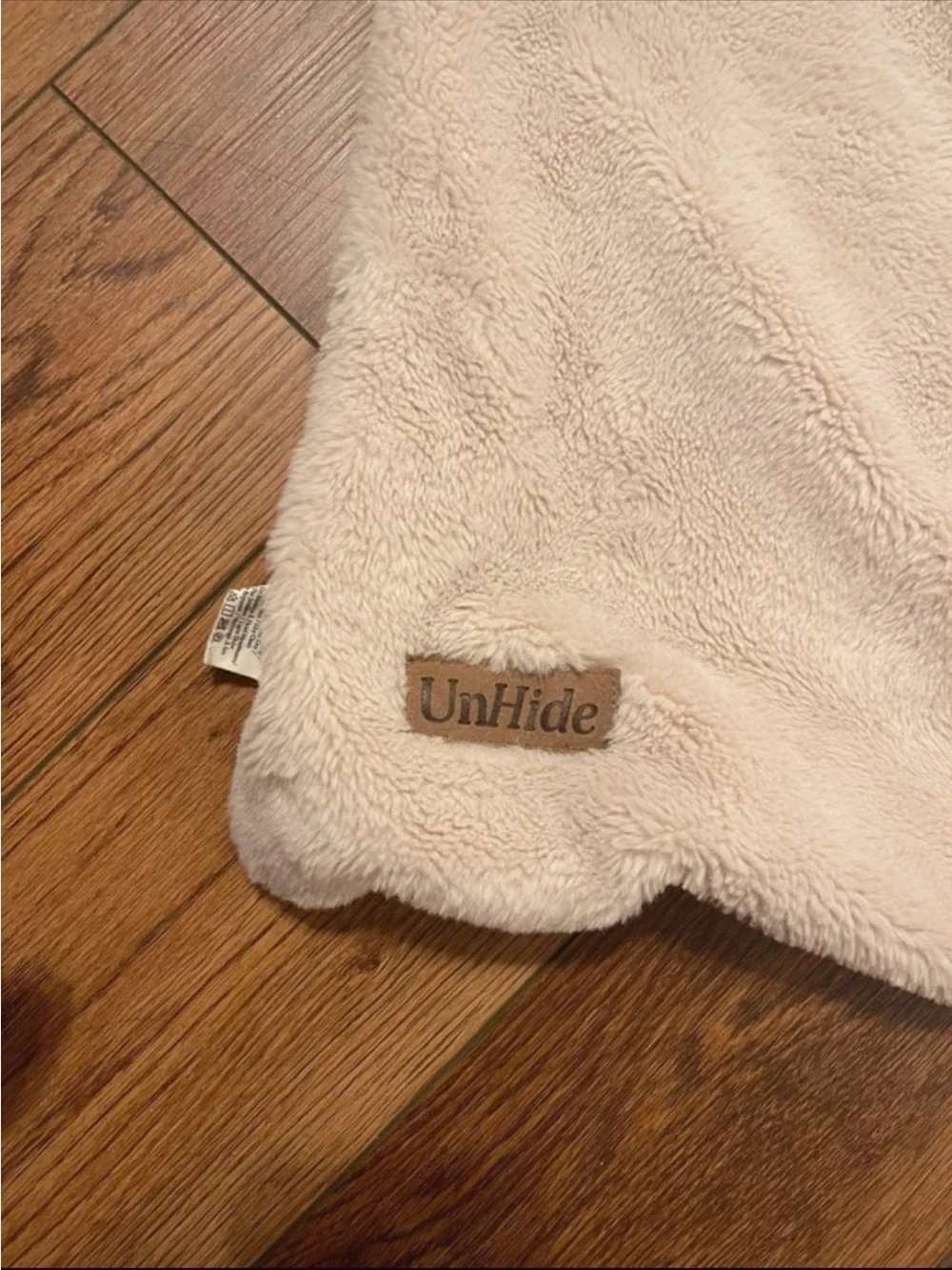 UnHide blanket in cream 60 by 80
